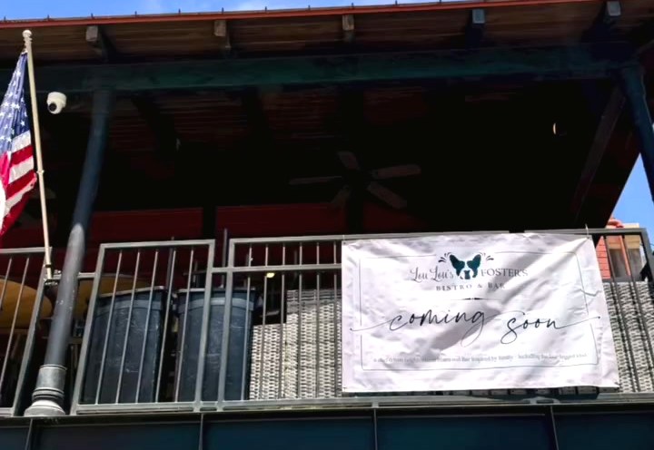 The banner on the balcony before opening