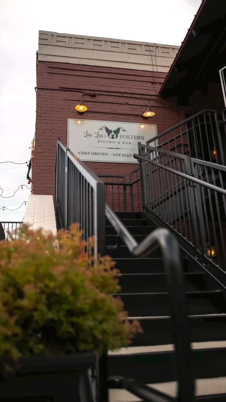 The staircase up to Foster's Bar at dusk