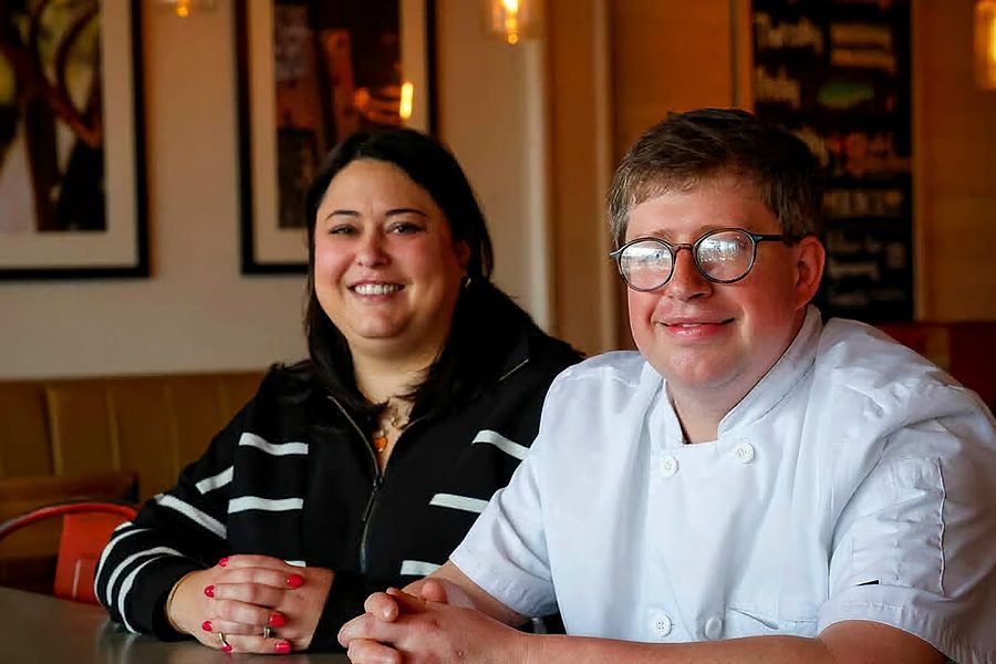 Chef Scott and Wesley Ailsworth, the owners, in their dining room